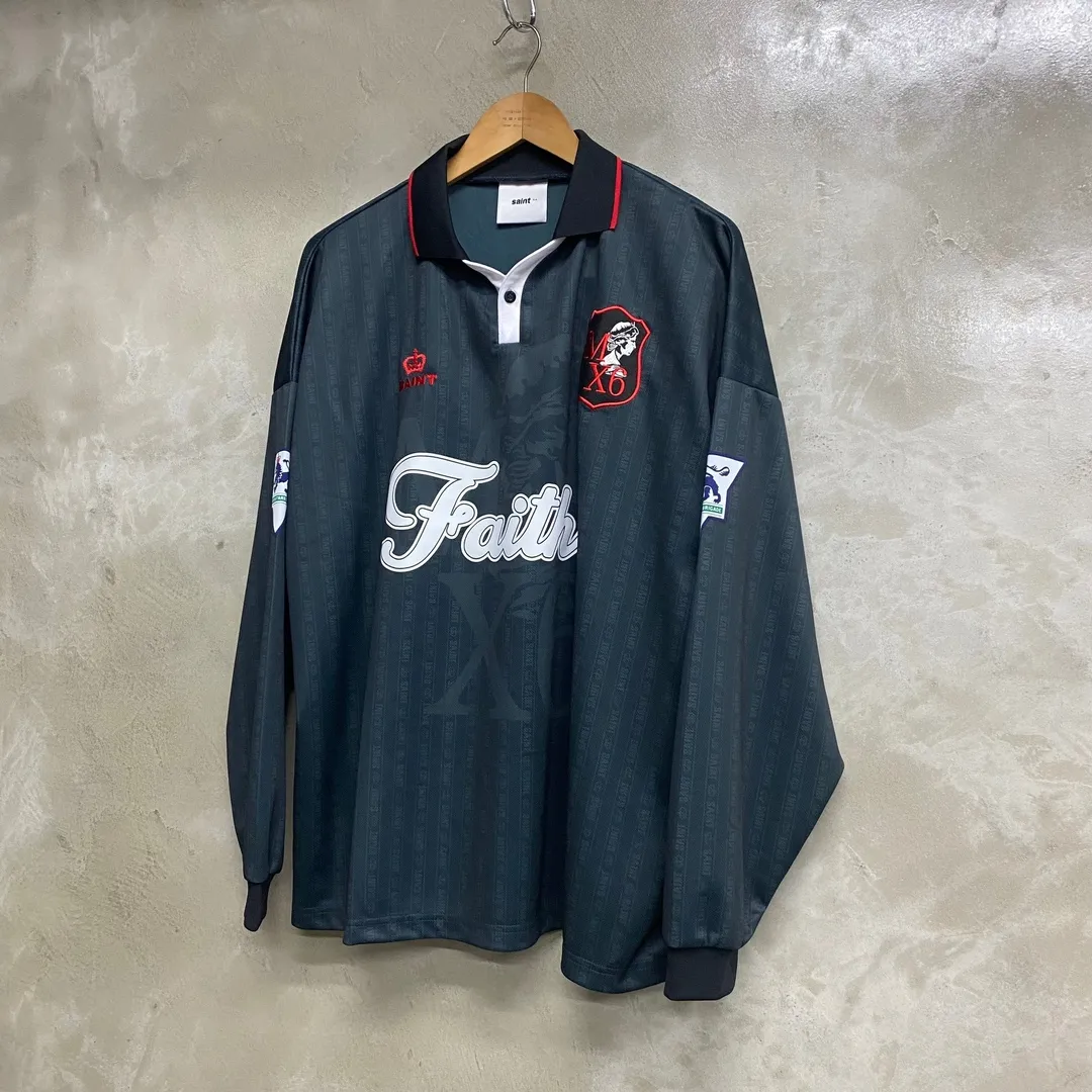 SAINT M×××××× SOCCER SHIRT 'FAITH'/BLK FAITH Football Long Sleeve Black S-XL This design has a lot of craftsmanship Digital fabric printing/front positioning printing laser cutting Offset printing + flocking printing + embossing Imported Behringer machine embroidery Flat machine collar + cuffs Genuine consistent main mark/wash mark/cherub mark